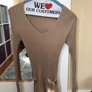 Long sleeved cream-colored shirt